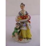Meissen chinoiserie figural group of a lady holding a basket of plums with a child, incised 2645