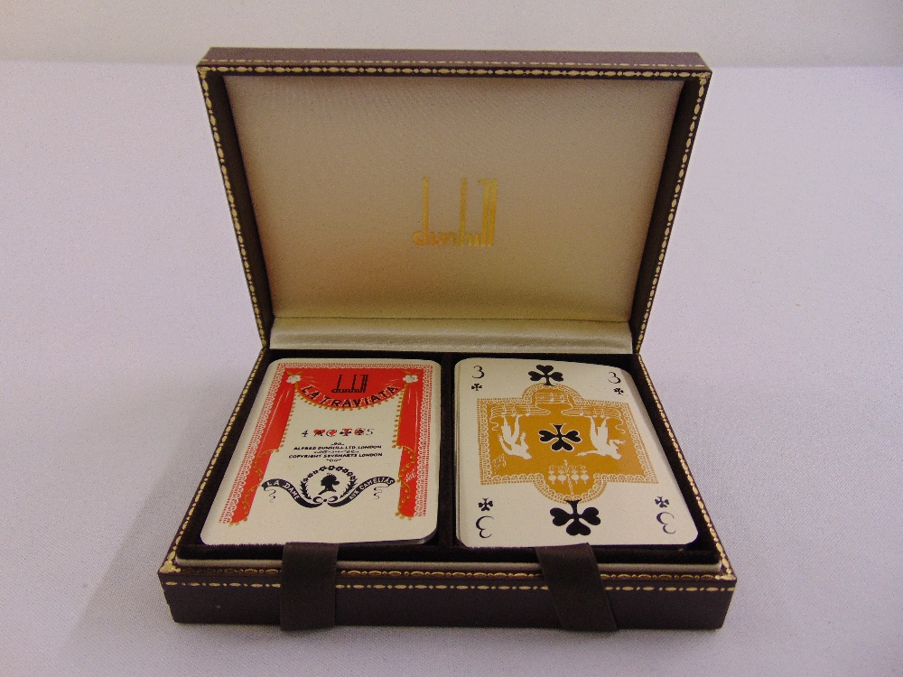 A Dunhill leather cased set of playing cards