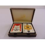 A Dunhill leather cased set of playing cards