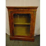 A 19th century rectangular inlaid display cabinet with hinged glazed door, gilded metal mounts on