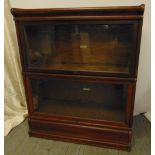 Globe Wernicke mahogany two section bookcase with raised plinth and top section, label to interior