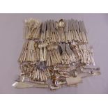 A quantity of Kings pattern silver plated flatware for twelve place settings to include servers