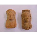 Two terracotta figural plaques of females