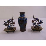 A cloisonné vase and two cloisonné decorative bird stands