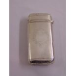 A Victorian silver engine turned cigar case, rounded rectangular with hinged cover, London 1845