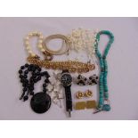 A quantity of costume jewellery to include a wristwatch, cufflinks and earrings