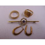 A quantity of gold jewellery to include a 15ct seed pearl and sapphire brooch, 9ct rings and a