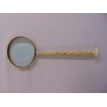 A Victorian magnifying glass with turned ivory handle, A/F