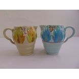 Two Clarice Cliff Newport Pottery Celtic Leaf and Berry pattern flower jugs, marks to the base 41a