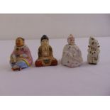 Four oriental miniature porcelain figurines, three with nodding heads