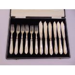 A cased set of silver hallmarked fish eaters with Mother of Pearl handles