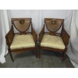 A pair of early 20th century Sheraton style bergere armchairs with eighteenth century style