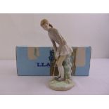 Lladro lady golfer figurine in original packaging