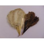 Two Victorian ostrich feather fans of customary form, A/F