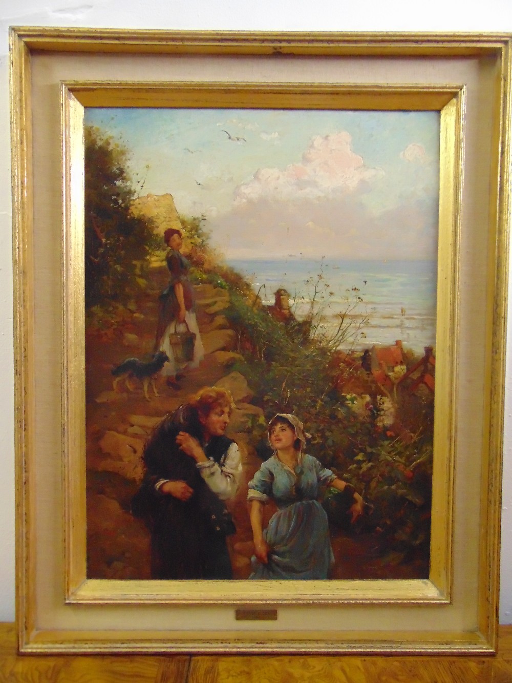 Frank E. Cox framed oil on canvas titled Fisher Folk on a Rocky Path, 61 x 46cm