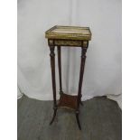 A rectangular mahogany square plant stand with marble galleried top, on four outswept legs