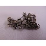 A silver and marcasite watch brooch in the form of a coach and horses