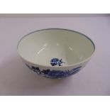 A Worcester first period porcelain blue and white bowl decorated with flowers and leaves, crescent