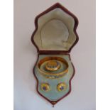 A Victorian suite of yellow gold and enamel jewellery in original fitted leather case to include a