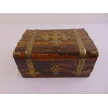 An Asher and Sherwin coromandel and maple rectangular jewellery casket with applied brass strap