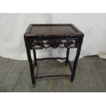 A Chinese hardwood rectangular side table carved and pierced with flowers and leaves, A/F