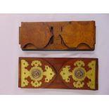 Two Victorian book slides one with brass mounts set with Egyptian medallions