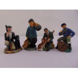 Four Royal Doulton figurines The Gamekeeper HN2879, The Master HN2325, The Lobster Man HN2317 and
