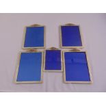 Five rectangular silver photograph frames