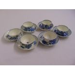 Six Worcester first period tea bowls and saucers decorated with flowers and leaves