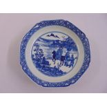 A Chinese blue and white dish decorated with figures in a landscape, character mark to base