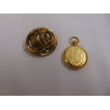 A Victorian yellow gold brooch and a locket A/F both tested 15ct, approx total weight 13.0g