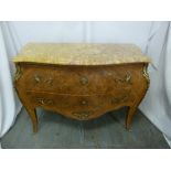 A Louis XVI style rectangular Kingswood inlaid chest of drawers, with marble top and gilded metal