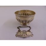 A Victorian silver circular bowl part fluted on raised circular base, London 1898 and a pierced
