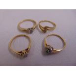 Four 9ct yellow gold rings set with diamonds, approx total weight 5.4g