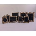 Eight hallmarked silver mounted photograph frames of various shape and size