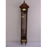 A continental mahogany rectangular mercury wall mounted barometer with silvered dial and glazed