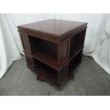 A mahogany square revolving bookcase