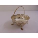 A Victorian silver circular sugar bowl, the sides chased with flowers and leaves with rope twist