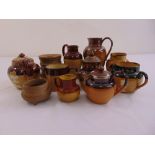 A quantity of Doulton Lambethware to includes teapots, mugs and cream jugs (11)