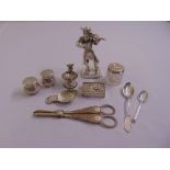 A quantity of silver and white metal to include a snuff box, a pair of grape scissors, a caddy spoon