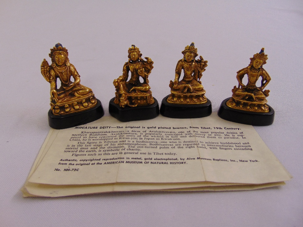 Four miniature gold plated Deities mounted on raised lotus thrones to include Vasudhara,