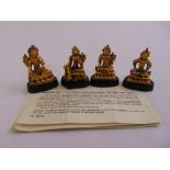 Four miniature gold plated Deities mounted on raised lotus thrones to include Vasudhara,