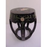 A mid 20th century conical shaped garden seat lacquered and painted with flowers and leaves in the