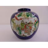 A Chinese ginger jar and cover decorated with stylised figures