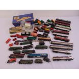 A quantity of playworn OO gauge model railway to include engines, rolling stock and accessories