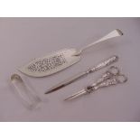 George IV silver fish slice, scroll pierced blade, London 1825, a pair of sugar knipps, a letter