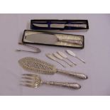 A pair of Victorian silver fish carvers hallmarked blades London 1859, two silver handled knives,