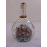 A painted three-masted galleon in a pear shaped glass bottle