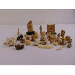 A quantity of ivory and bone Netsuke miniature figurines and an Inro (33)