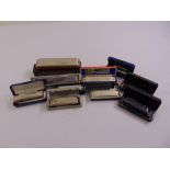 Ten harmonicas to include Hohner some in original cases